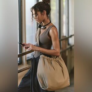 NWT FREE PEOPLE MOVEMENT REST DAY CARRYALL BAG SANDY